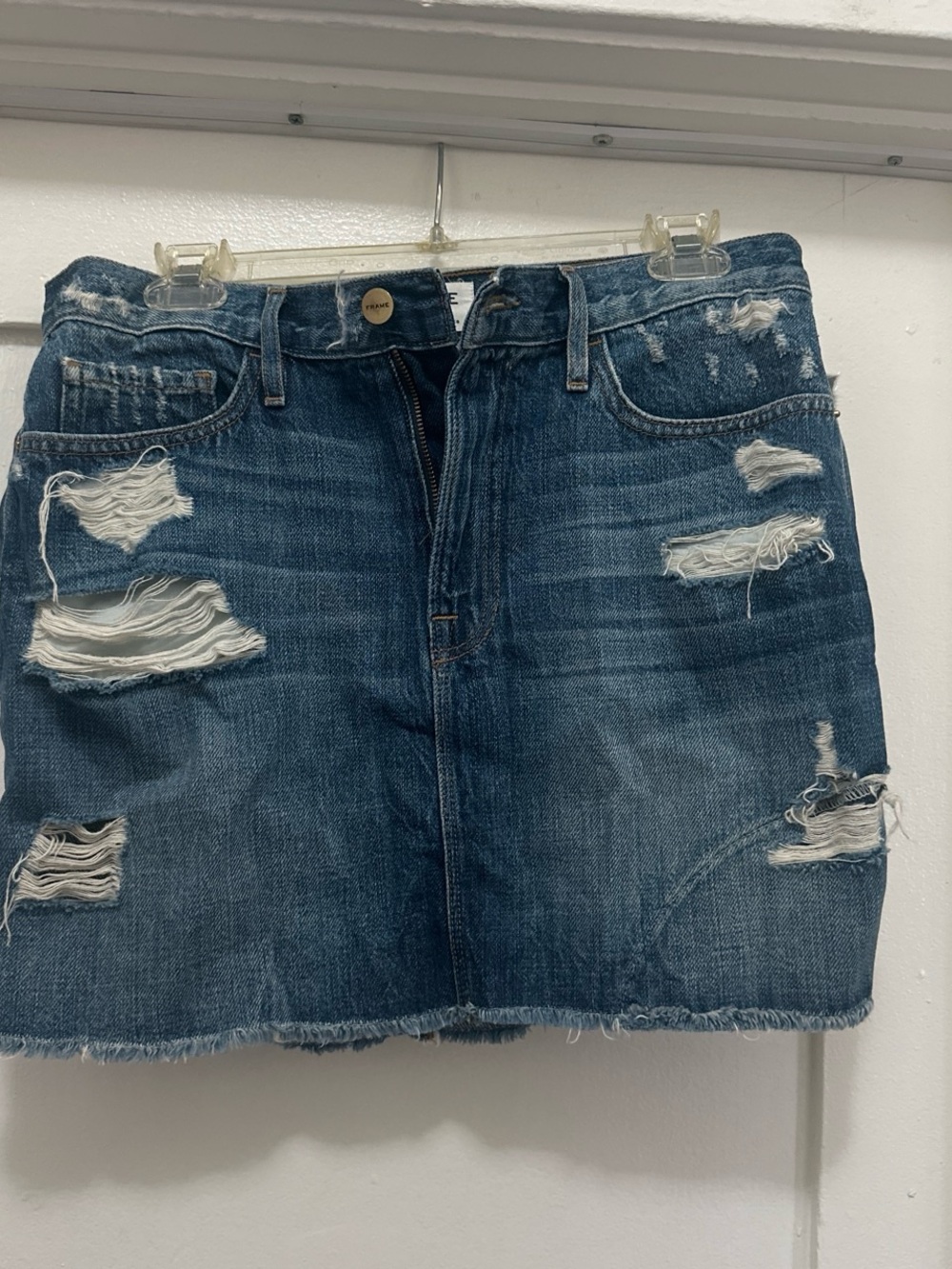 Frame Blue denim mini skirt with distressed details